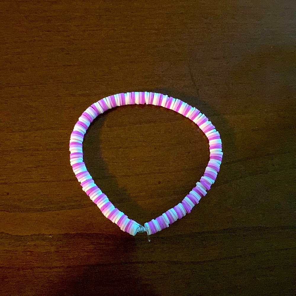 white,light purple, and dark purple handmade  bracelet!